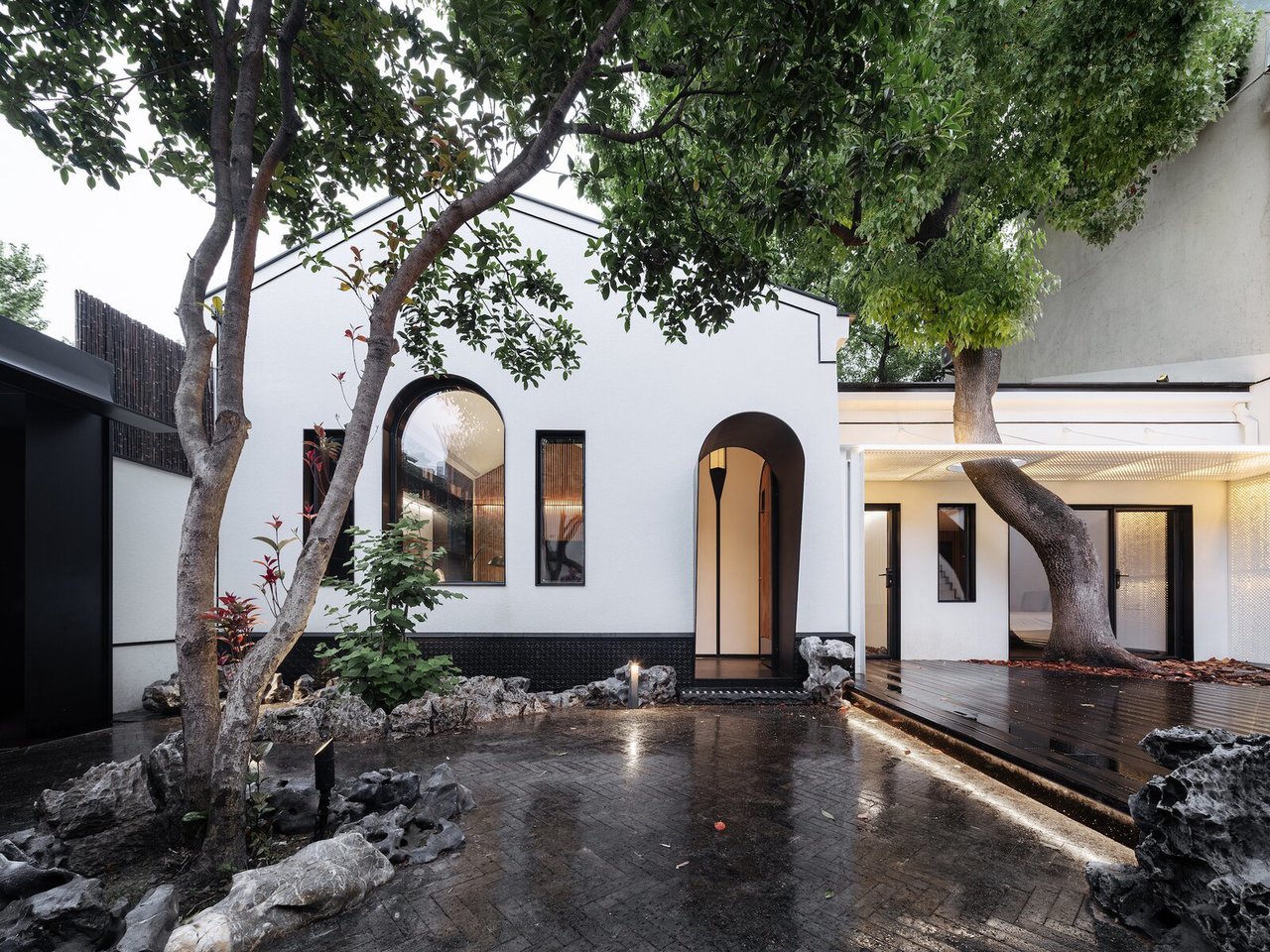A Volcanic-Rock Courtyard Energizes a Dramatic Home in Shanghai