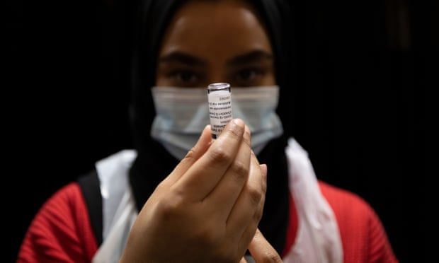 UK urged to give 20% of its Covid vaccines to other countries