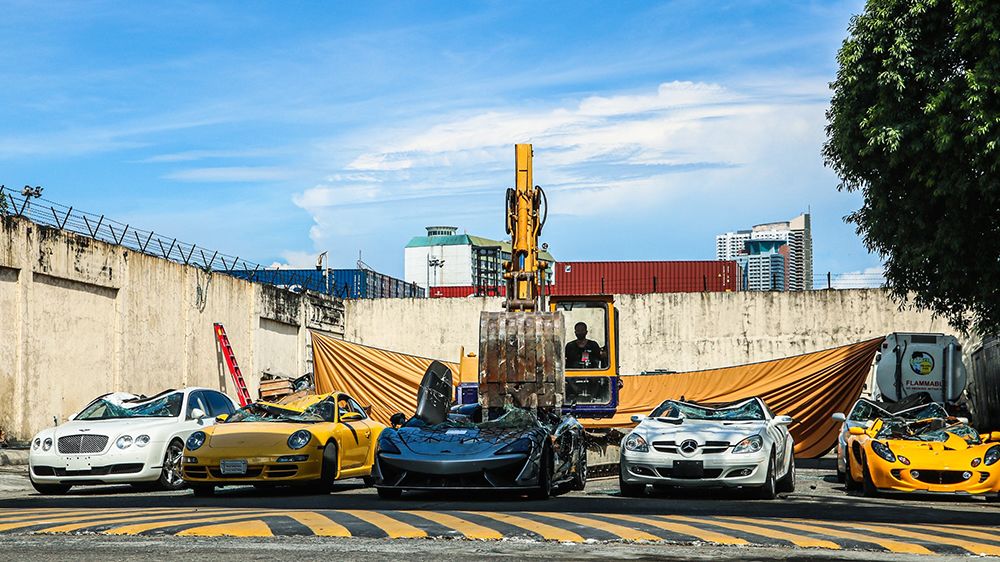 The Philippines Just Crushed $1.2 Million in Smuggled Luxury Cars, Including a McLaren 620R, Bentley, Mercedes-Benz, Lotus and Porsche 911 G2S