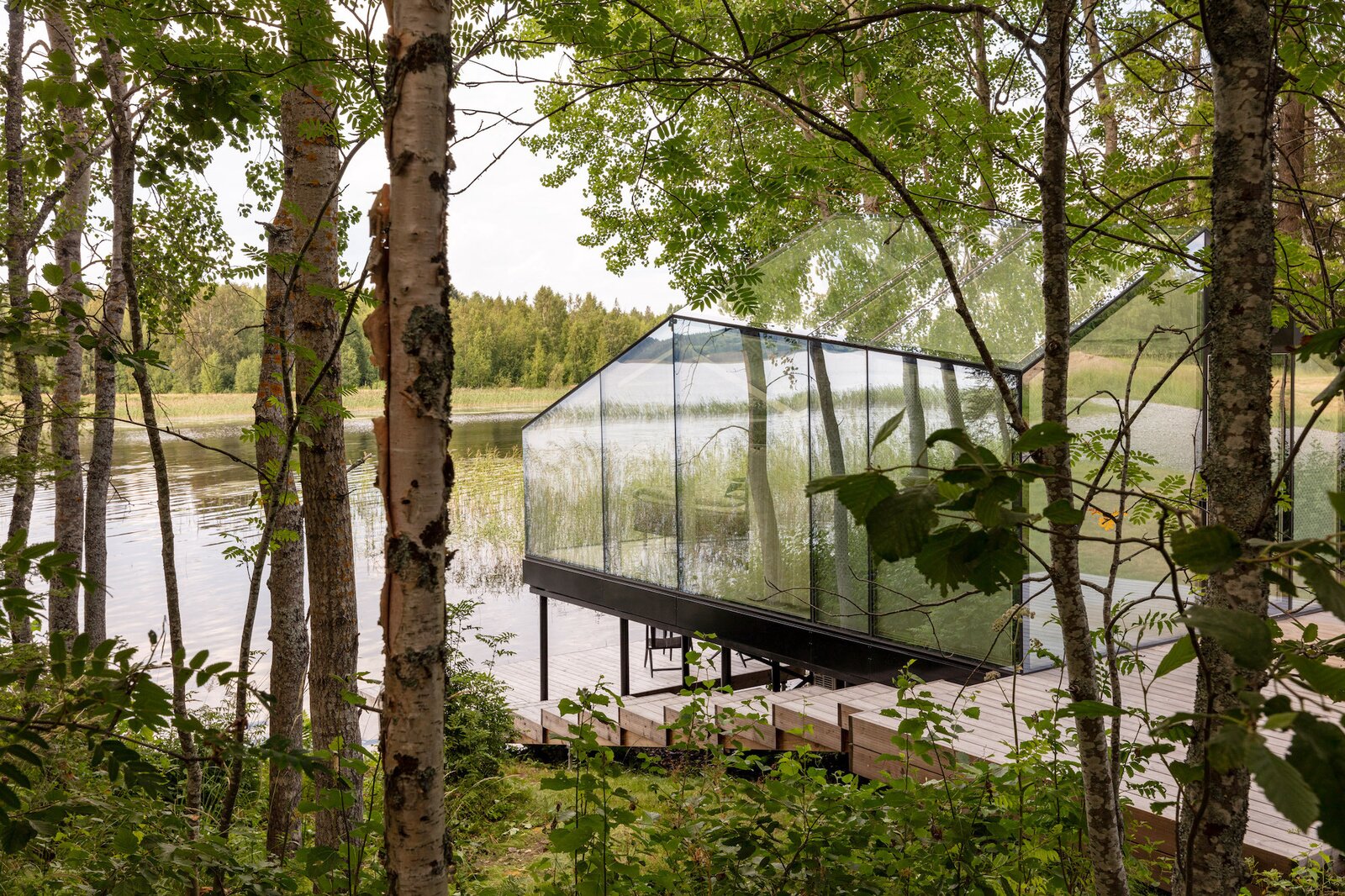 A Tiny Glass Cabin Perches for Wilderness Views in Remote Finland