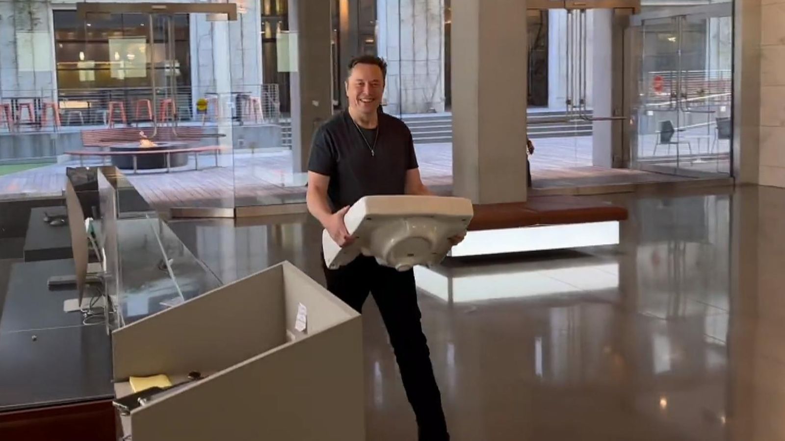 Elon Musk turns up at Twitter HQ carrying a sink as takeover nears completion
