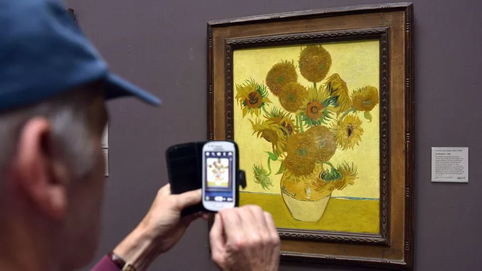 Van Gogh's Sunflowers back on display after oil protesters threw soup on it