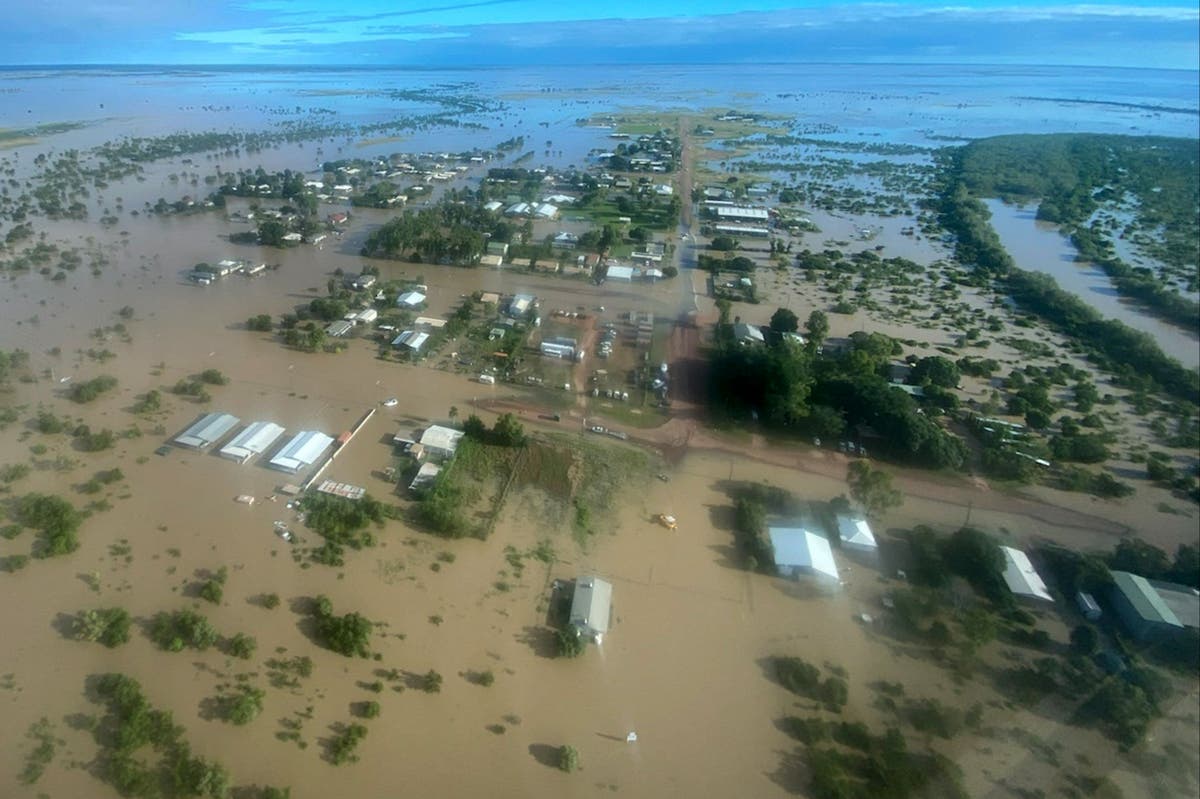 Residents stranded in crocodile-infested flood town in Australia